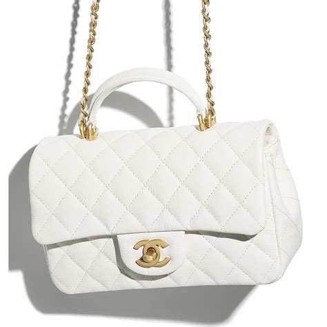 chanel mini flap bag with top handle white|Chanel mini classic flap bag.